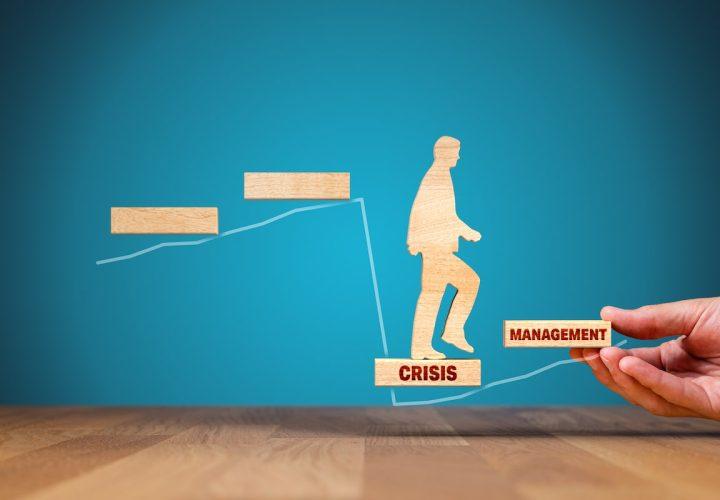cutout of a man walking up steps signifying managing a crisis